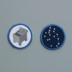 Two embroidered badges
